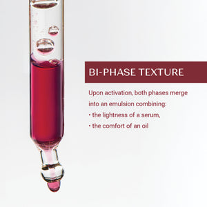 Close-up of a dropper containing a dual-phase liquid illustrating the bi-phase texture of Retinol-Like Bi-Serum | Yon-Ka Paris, highlighting its light serum and comforting oil blend.