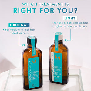 Two bottles of Moroccanoil Treatment | Moroccanoil displayed side by side with text comparing Original for medium to thick hair and curls, and Light for fine or light-colored hair.