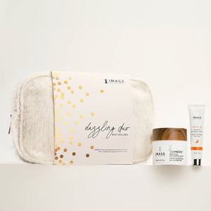 Dazzling Duo | IMAGE Skincare set featuring Ormedic balancing bio-cellulose cream, Vital C hydrating enzymatic cream, and a textured beige cosmetic pouch with gold accents.