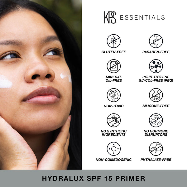 Woman applying Hydralux SPF 15 Primer | Kindness Powered Skincare with visible icons highlighting the product’s gluten-free, paraben-free, mineral oil-free, PEG-free, non-toxic, silicone-free, no synthetic ingredients, no hormone disruptors, non-comedogenic, and phthalate-free qualities.