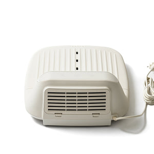 White compact air purifier device with vents and power cord designed for wellness use, featuring a sleek modern design, SUMSEI Air Shower | SUMSEI.