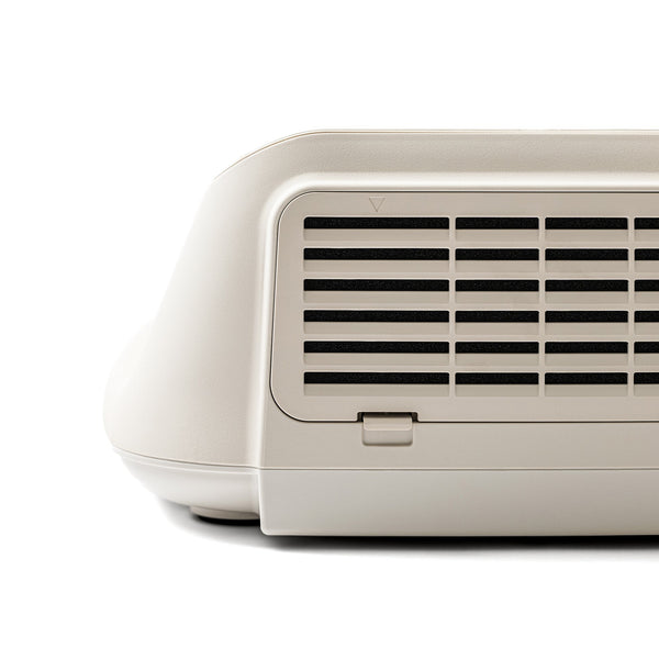 Close-up of a beige ventilation grille on the side of the SUMSEI Air Shower | SUMSEI, a wellness device designed for skincare and body care recovery.