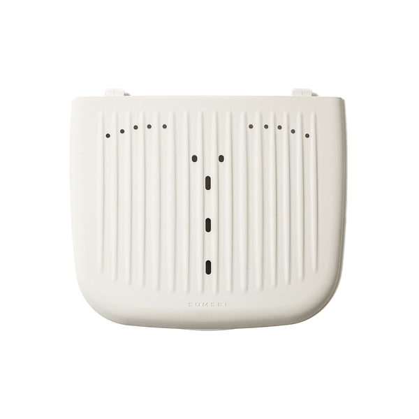 Top view of the SUMSEI Air Shower | SUMSEI, a sleek wellness device designed for skincare and body care recovery, featuring a minimalist white design with ventilation slits.
