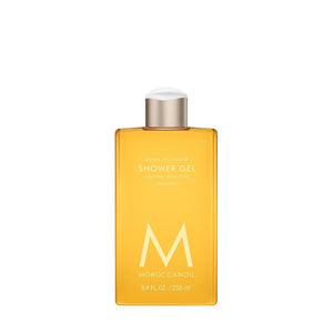Shower Gel | Moroccanoil in a sleek amber bottle with gold and white cap, designed for skincare and body care routines promoting hydration and cleansing.
