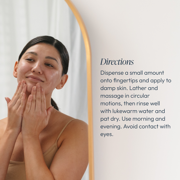 Woman applying Cleansing Gel with Mandelic Acid | Circadia to her face in front of a mirror, demonstrating gentle skincare routine with instructions visible nearby.