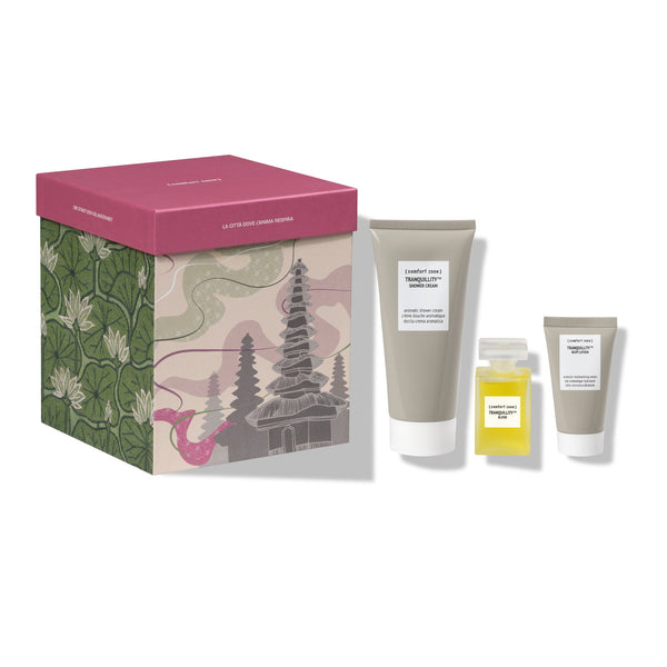 The City Serenity Kit | [ comfort zone ] featuring a decorative box with a serene nature design and three skincare products including a cleansing cream, oil, and balm for wellness and body care.