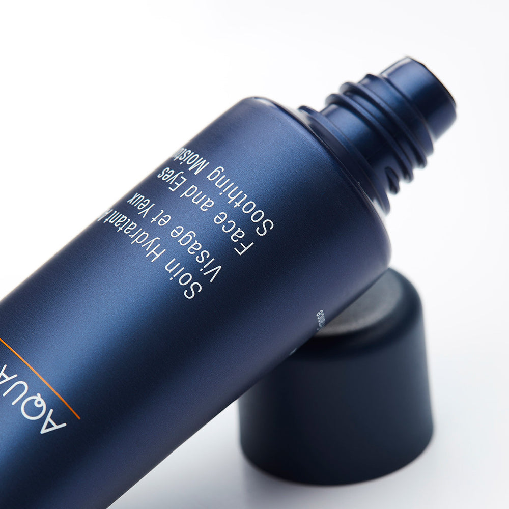 A sleek dark blue tube of Aqua Optimal Face and Eyes Soothing Moisturizer | Phytomer designed for skincare, focused on soothing and hydrating face and eye areas.