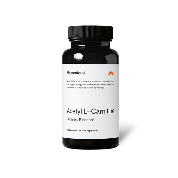 Black bottle of Acetyl L-Carnitine dietary supplement capsules promoting cognitive function and energy support for wellness supplements.