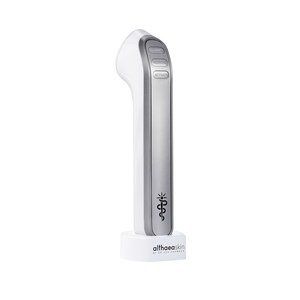 C·A·R·A Multi-Modal Tool Kit | Althaea Skin device in white and silver with buttons labeled Clear, Restore, and Activate, standing on a branded base for skincare and wellness use.
