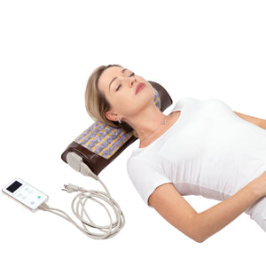 A woman resting comfortably with her head supported by the Amethyst Bolster Firm - Heated InfraMat Pro® | HealthyLine, a wellness device designed for relaxation and recovery.