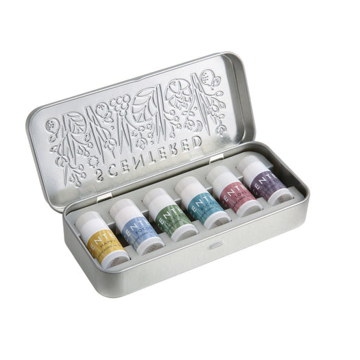 Wellbeing Ritual Aromatherapy Mini Tin | Scentered featuring six small bottles in a silver embossed metal tin, designed for wellness and relaxation through aromatherapy.