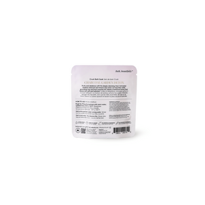 Back of a pale lavender pouch of Charcoal Garden Detox Crush | Bathorium with product information directions ingredients icons and barcode on the label