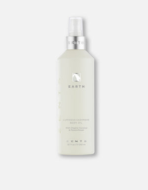 Bottle of Body Oil | Zents Earth Luminous Cashmere with organic coconut and passionflower on a white background for skincare and body care wellness.