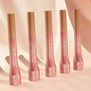 Five shades of Eyebrow Cream | Chella in soft pink tubes with gold caps displayed on a light beige background, showcasing a range of natural eyebrow colors for skincare and beauty.