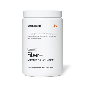 Container of Fiber+ dietary supplement by Momentous, promoting digestive and gut health with a comprehensive fiber formula, unflavored for wellness and metabolic support.