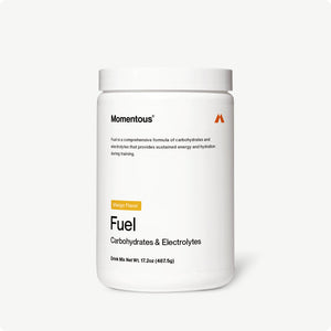 White jar of Fuel mango flavored carbohydrate and electrolyte drink mix by Momentous for hydration and sustained energy during training