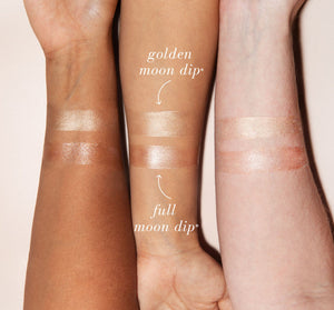 Swatches of Full Moon Dip® Iridescent Illumination Ageless Facial Mousse with Peptides + Retinol | Farmhouse Fresh on three different skin tones showing the golden moon dip and full moon dip shades with a luminous finish.