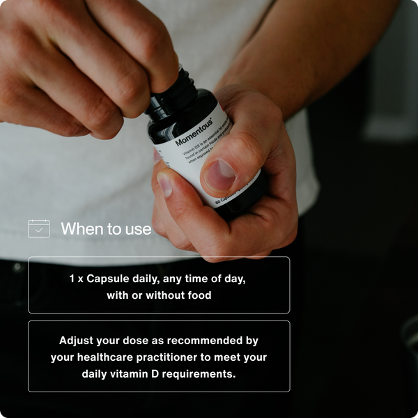 Person opening a bottle of capsules with text explaining how to use Vitamin D3 2000 IU by taking one capsule daily, anytime with or without food, and adjusting dosage per healthcare advice.