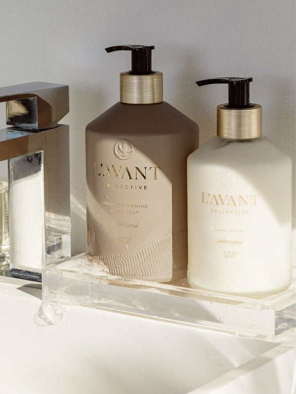 L'AVANT Hand Soap and Lotion Ambre Santal on bathroom tray