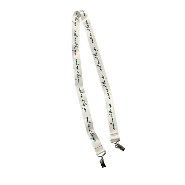 Meet Me at The Spa Clip Lanyard | Live Love Spa features a white fabric strap with teal script text and metal clips, ideal for holding spa or wellness accessories.