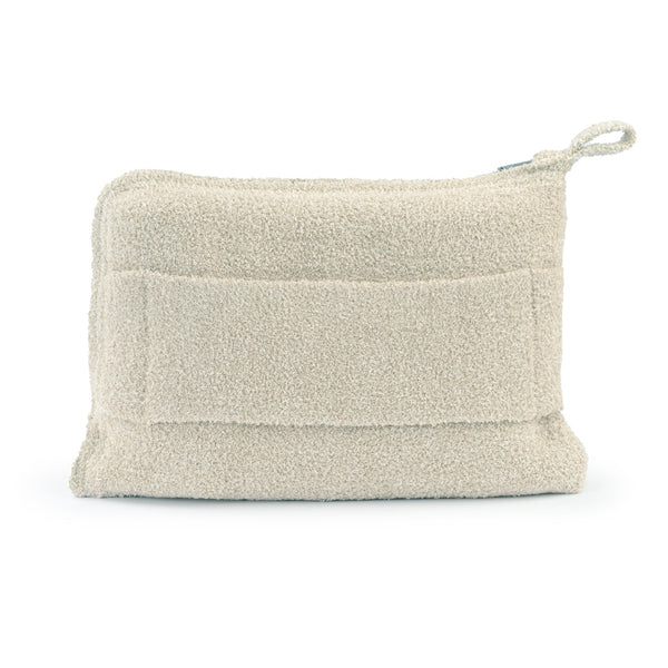 Soft beige textured travel pouch with a loop handle, part of the Travel Set (Blanket, Socks, Eyemask, Bag) | Kashwére, designed for convenient and stylish portability.