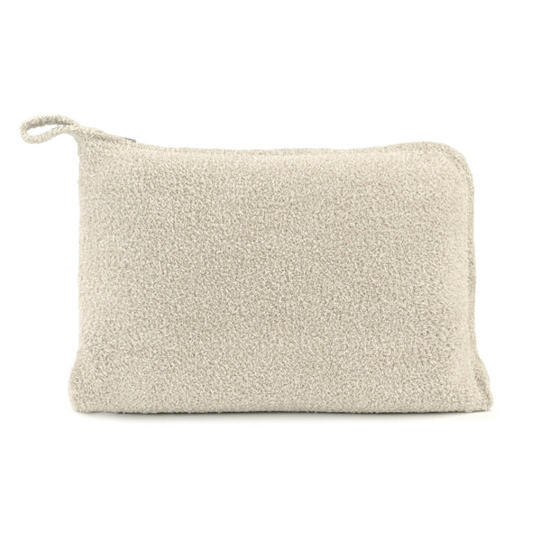 Soft beige textured pouch with a loop handle, part of the Travel Set (Blanket, Socks, Eyemask, Bag) | Kashwére, designed for organized and stylish travel storage.