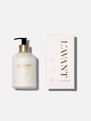 Elegant bottle and box of Hand Lotion - Fresh Linen | L'AVANT Collective with gold accents, offering premium skincare for soft and hydrated hands.