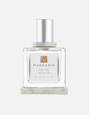 Transparent square glass bottle with a silver cap containing Eau de Toilette | Zents Mandarin fragrance, featuring a minimalist white label and light orange accent.