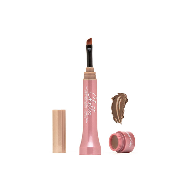 Tube of Eyebrow Cream | Chella with angled brush applicator, accompanied by a swatch of medium brown eyebrow cream on a white background.