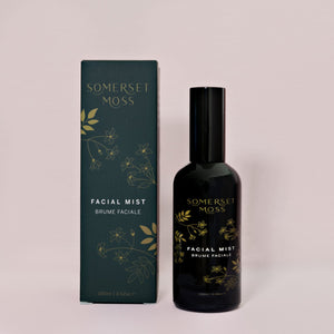 Facial Mist | Somerset Moss in a sleek dark bottle with gold floral design next to its matching box, a skincare product for refreshing and hydrating the skin.