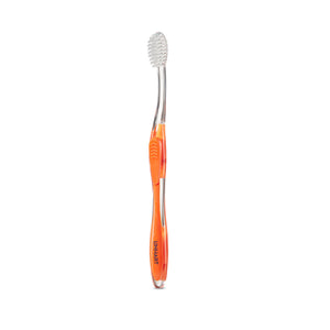 Nano-Silver Toothbrush | LINHART with a clear and orange handle, featuring soft bristles designed for effective oral care and improved dental hygiene.