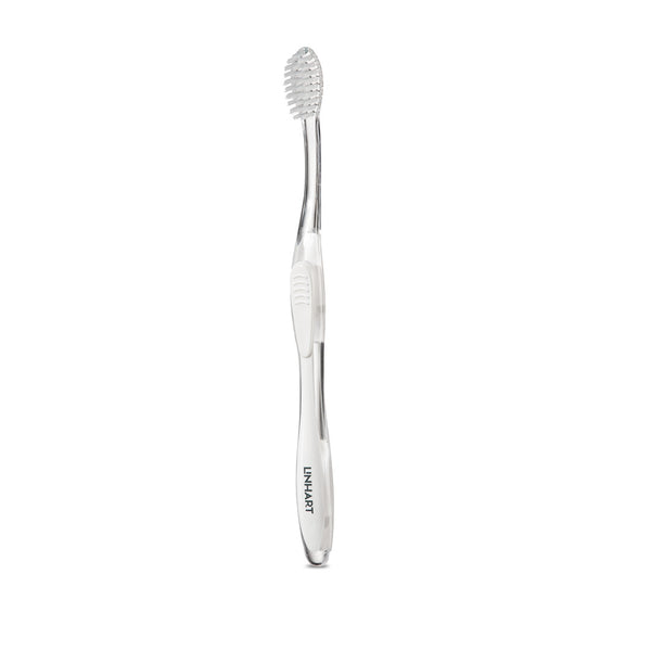 Nano-Silver Toothbrush | LINHART with a sleek, ergonomic transparent handle and soft, densely packed bristles designed for effective oral care and enhanced dental hygiene.