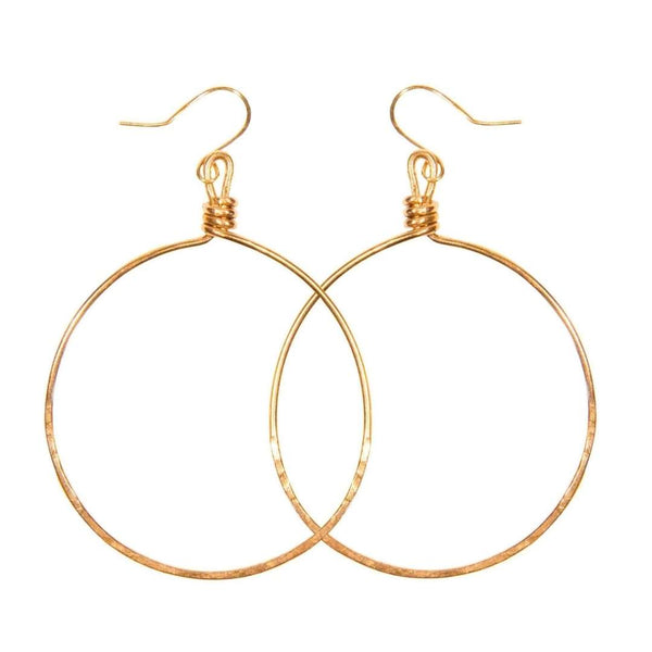 Pair of simple, elegant gold-tone hoop earrings with delicate wire wrapping at the top, showcasing Olivia Hoop Earrings | Purpose Jewelry.