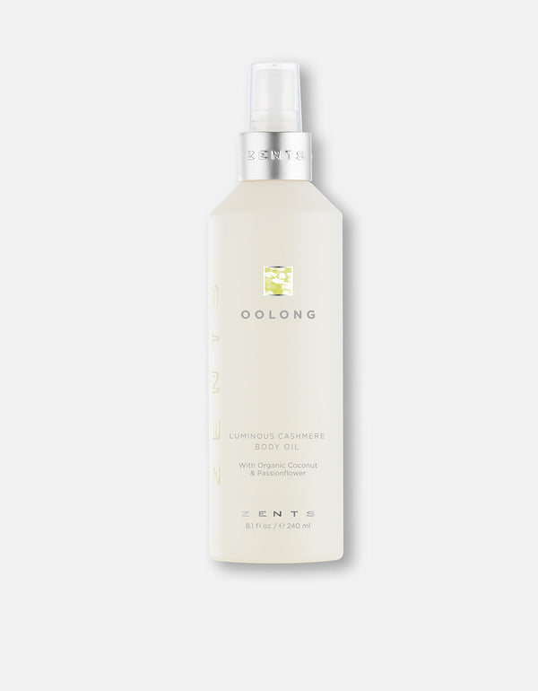 Bottle of Body Oil | Zents with a sleek, light-colored design featuring a pump dispenser, promoting skincare and body care wellness.