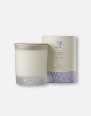 Aromatic Candle | Zents in a frosted glass container with a wooden lid, paired with its floral-themed packaging, highlighting a hand-poured soy wax design.