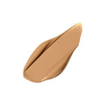 Swatch of smooth, medium beige PureMatch Liquid Concealer | Jane Iredale with creamy texture suitable for skincare and flawless coverage.
