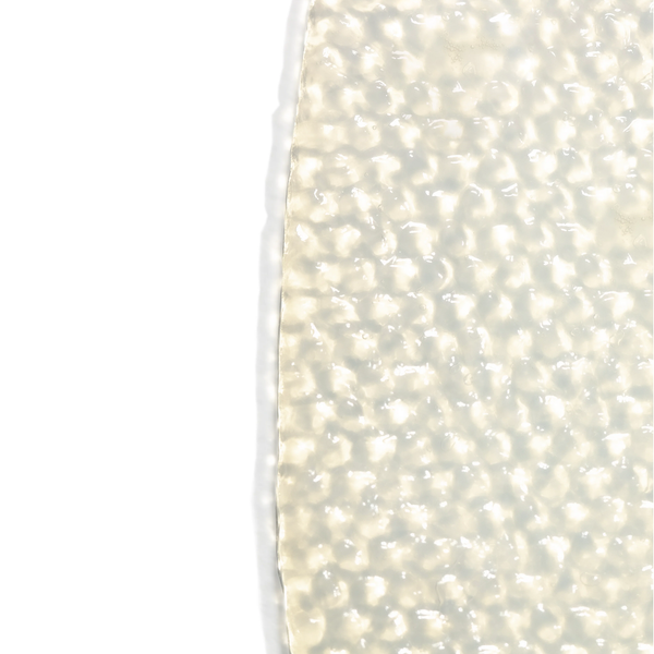 Close-up of a translucent, textured sheet mask material highlighting its soft, cushion-like cellular structure for the SkinTensity Advanced BioCellular Sheet Masque | Skin Fitness Therapy skincare product.