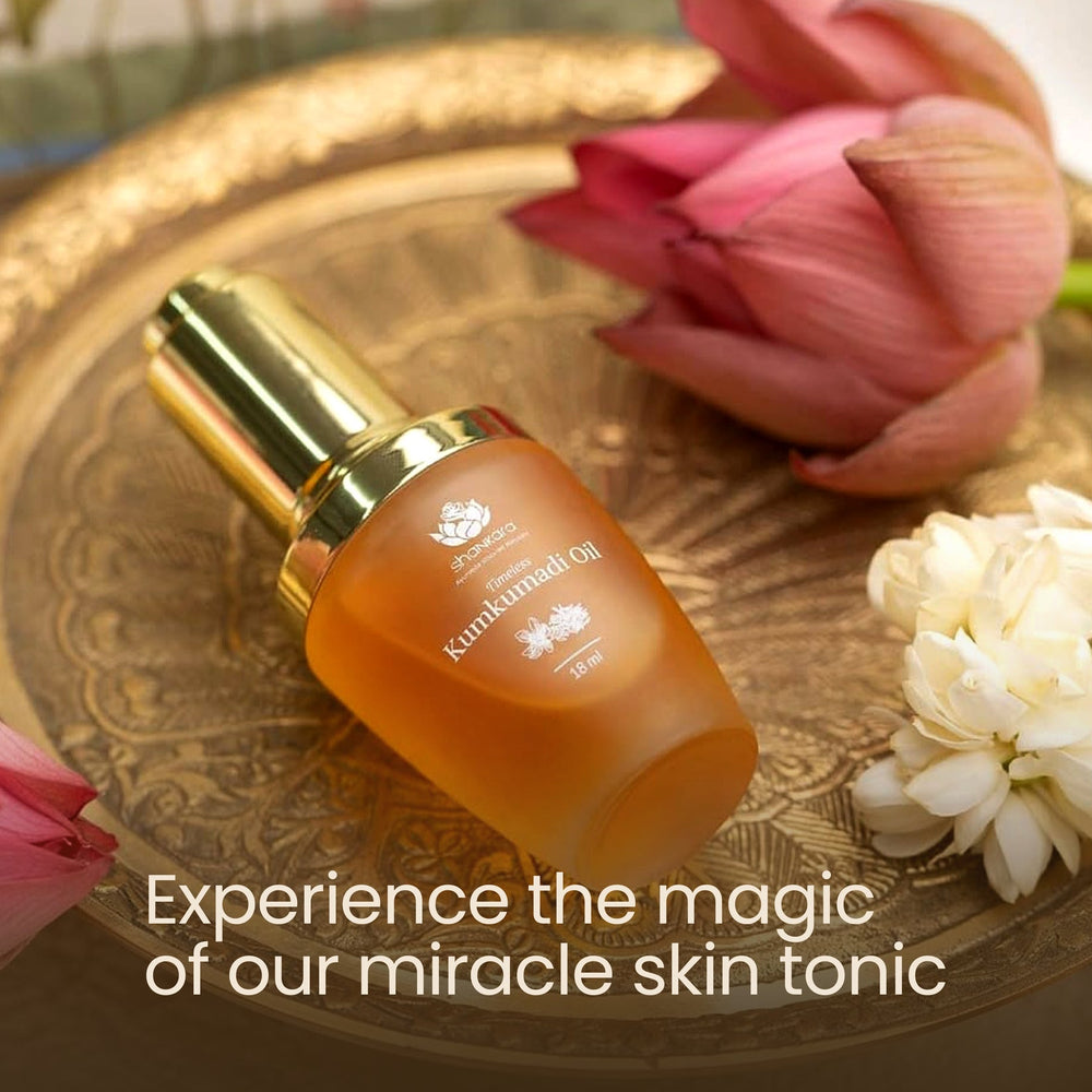 Bottle of Timeless Kumkumadi Oil | Shankara with golden cap and amber-colored glass, a luxury skincare product for glowing and radiant skin.