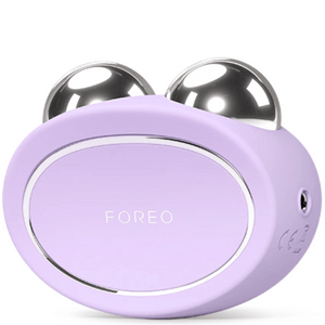 BEAR™ 2 | FOREO facial toning device in lavender with two smooth metal spheres designed for skin care and wellness recovery treatments.
