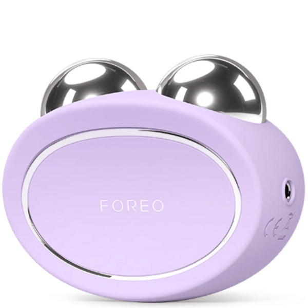 BEAR™ 2 | FOREO facial toning device in lavender with two smooth metal spheres designed for skin care and wellness recovery treatments.