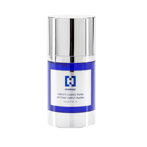 Blue and silver container of Complete Cleanser - Purify | Hommage skincare product designed for deep cleansing and purifying the skin.
