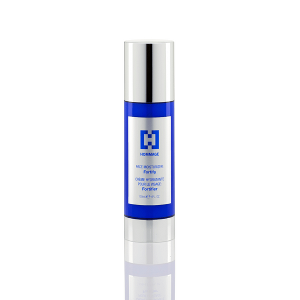 Sleek blue and silver bottle of Face Moisturizer 120mL | Hommage designed for skincare, featuring a modern label and reflective surface on white background.