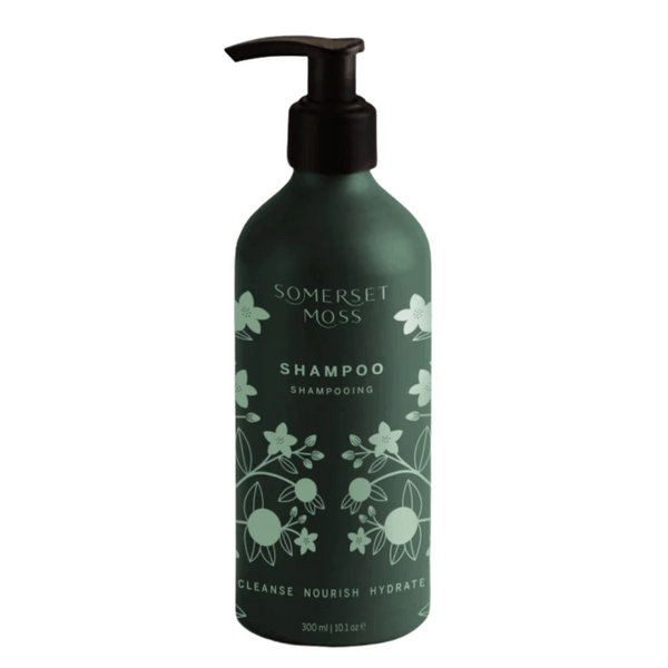 Bottle of Shampoo | Somerset Moss with floral design, featuring a pump dispenser, designed to cleanse, nourish, and hydrate for hair care and wellness.