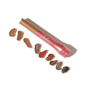 Eyebrow Cream | Chella with a variety of natural shades swatched beside the applicator tube designed for precise eyebrow definition and grooming.
