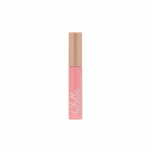 A sleek pink and beige tube of Eyebrow Defining Gel Clear | Chella displayed on a white background, designed for precise eyebrow styling and grooming.