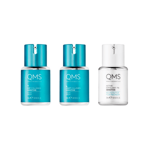 Three skincare serum bottles including Day Collagen Sensitive, Night Collagen Sensitive, and Active Exfoliant 7% Sensitive from the Collagen System Sensitive 3-Step Routine Set | QMS Medicosmetics.