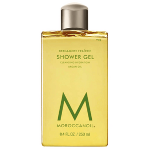 Clear golden yellow bottle of Shower Gel | Moroccanoil with silver cap, labeled with bergamot fragrance and argan oil for cleansing hydration, 8.4 fluid ounces.