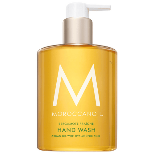 Hand Wash | Moroccanoil in a clear amber bottle with a white pump, featuring argan oil and hyaluronic acid for skincare and body care wellness.