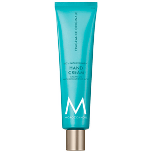 Tube of Hand Cream | Moroccanoil in turquoise packaging with silver cap, featuring argan oil and hyaluronic acid for rich nourishment and skincare benefits.