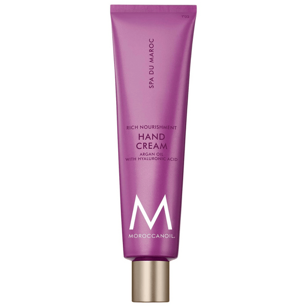 Purple tube of Hand Cream | Moroccanoil featuring argan oil and hyaluronic acid for rich nourishment in skincare and body care routines.